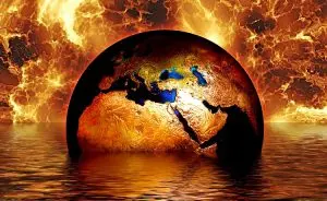 Planeta Terra parcialmente dentro do mar com chamas ao fundo